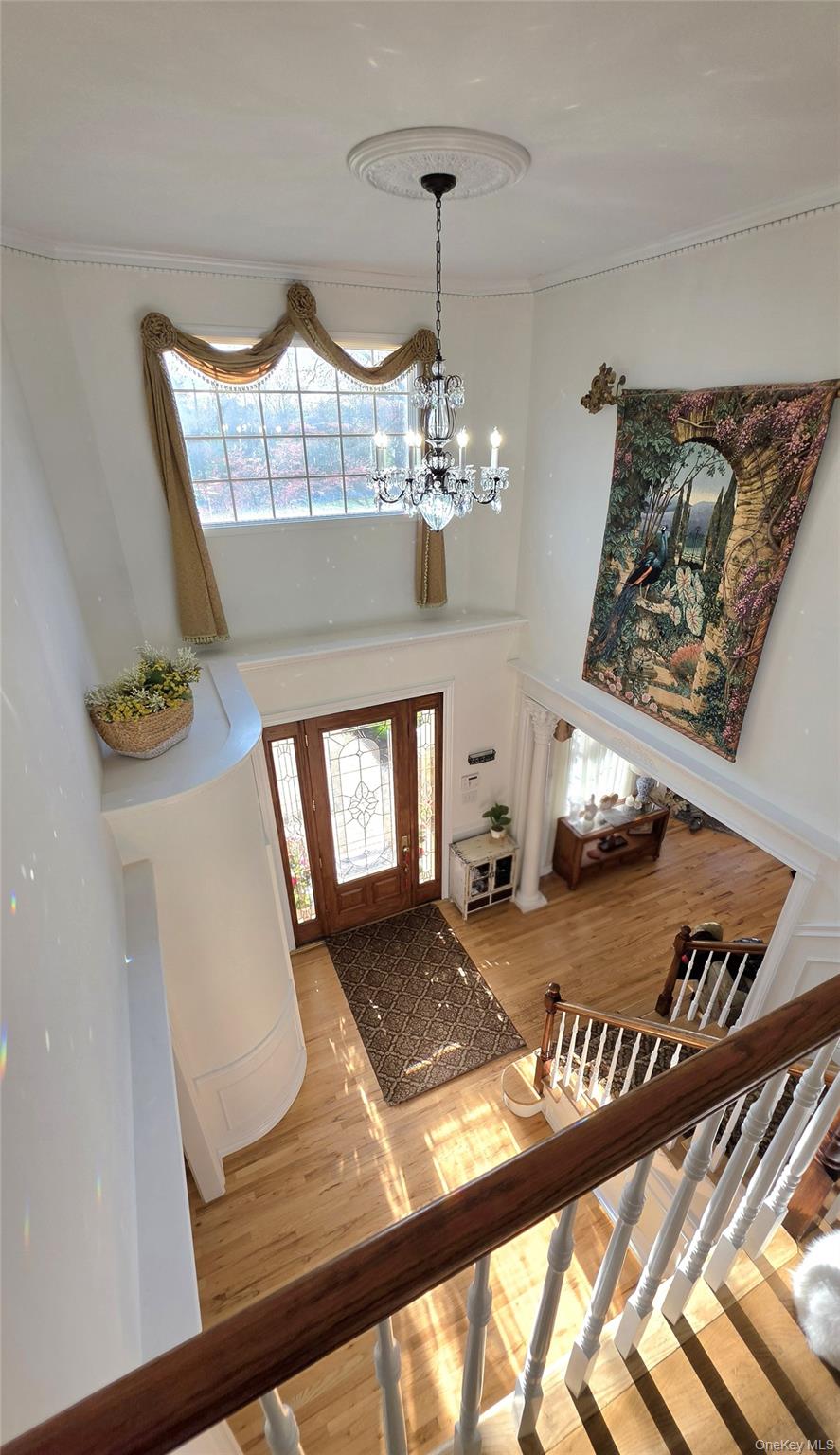 185 West Islip Road West Islip, NY 11795 - Photo 5 of 50 GORGEOUS and GRAND from the moment of entry! Top tier Custom millwork and Crown molding throughout.