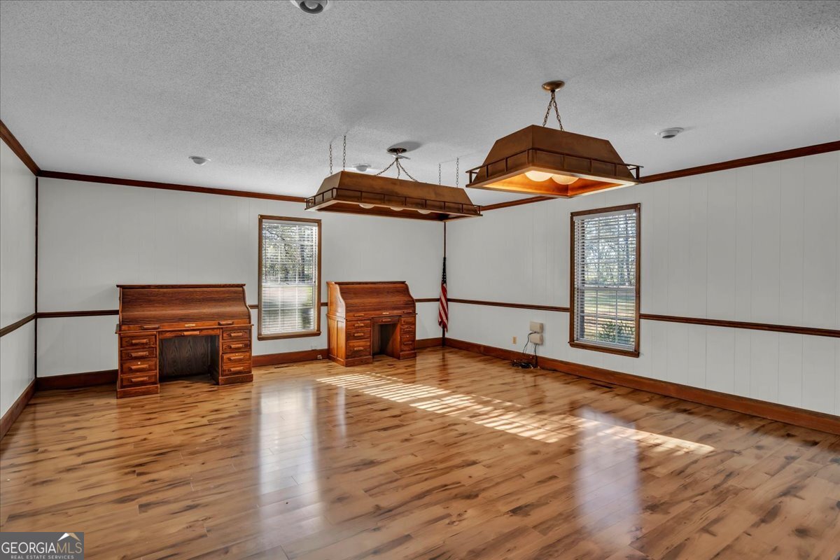 6501 Harley Trail Blackshear, GA 31516 - Photo 13 of 69 a room with wooden floors and natural light