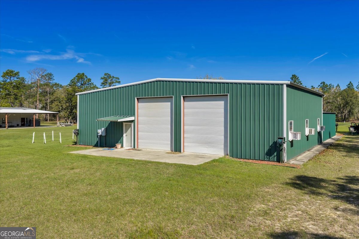 6501 Harley Trail Blackshear, GA 31516 - Photo 45 of 69 a front view of a house with a yard