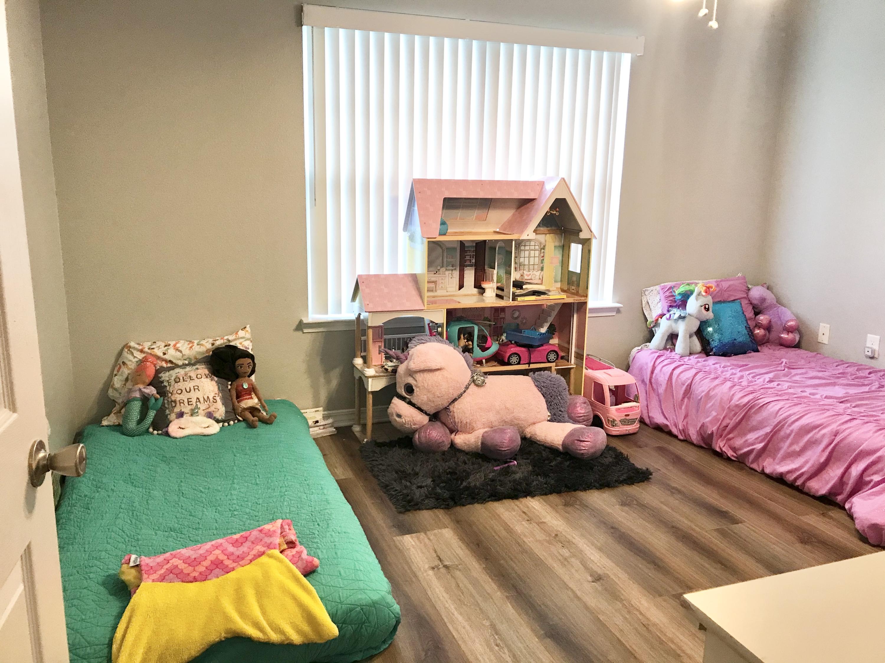 6593 Old River Road Baker, FL 32531 - Photo 6 of 23 a bed room with a bed and a couch