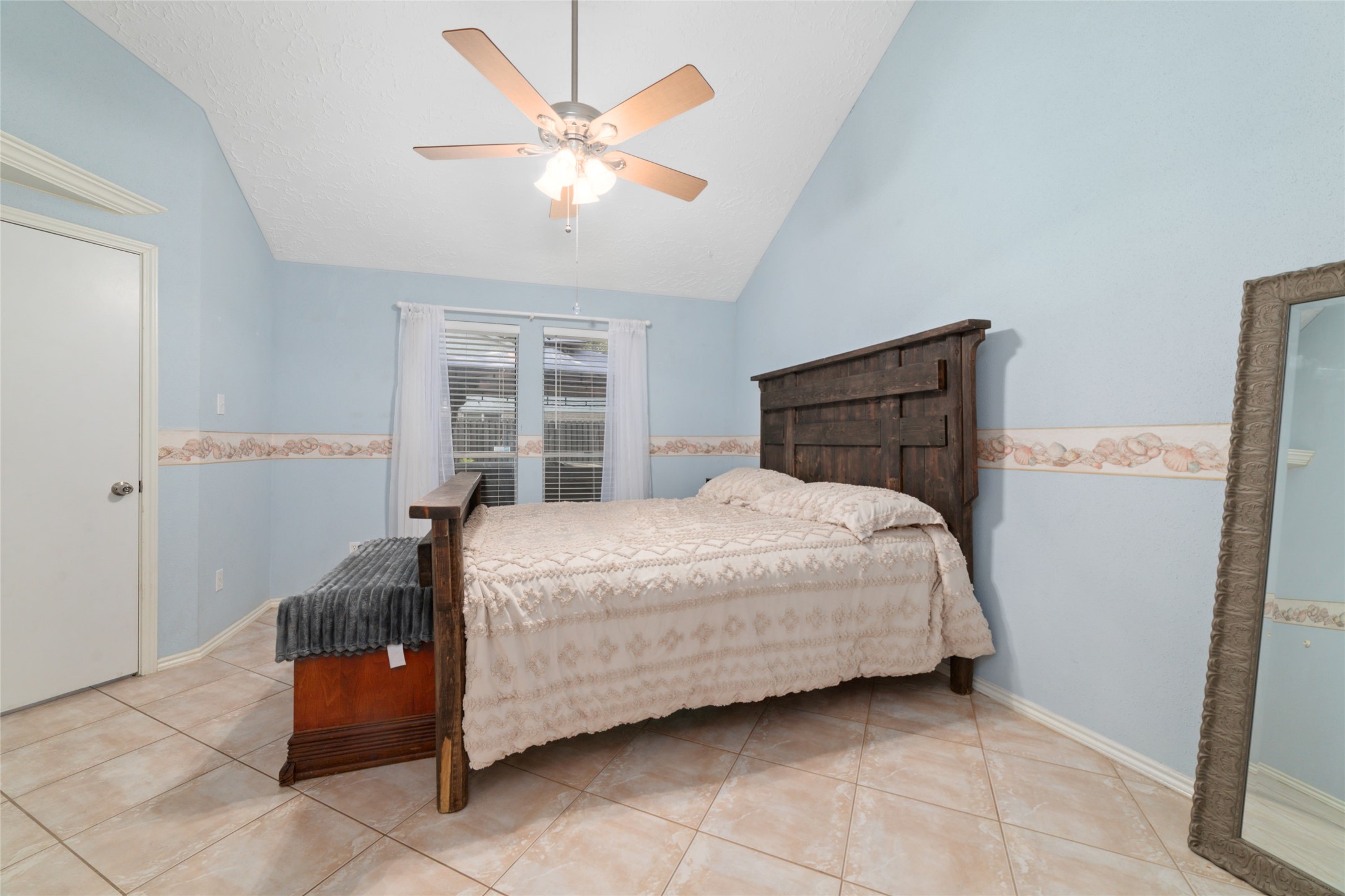 3315 Haydee Road Spring, TX 77388 - Photo 18 of 29 a bedroom with a bed and a window