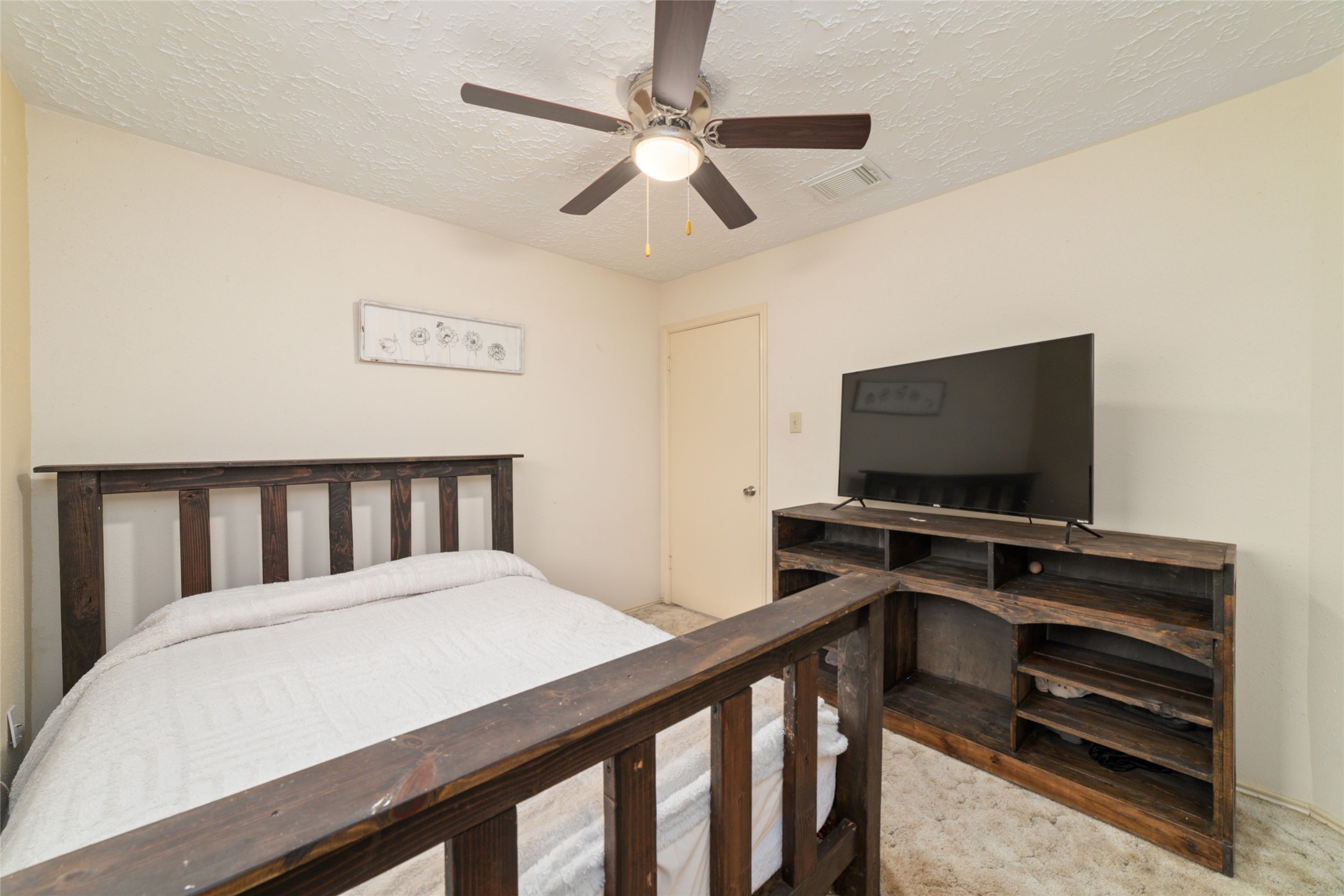 3315 Haydee Road Spring, TX 77388 - Photo 21 of 29 a living room with furniture and a flat screen tv