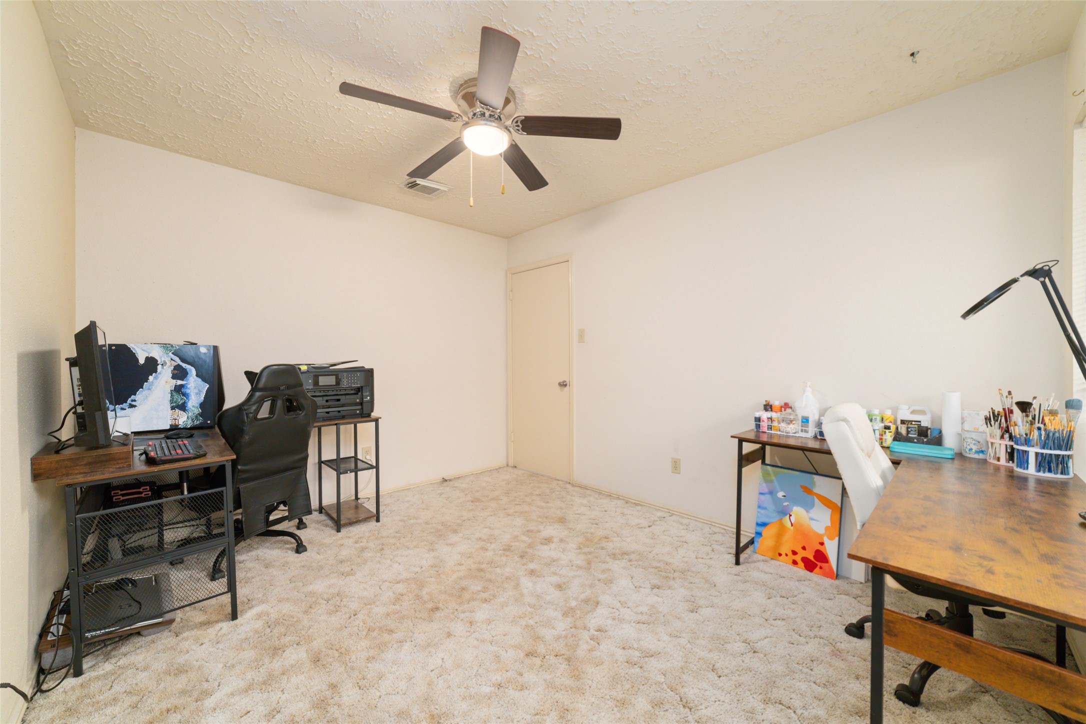 3315 Haydee Road Spring, TX 77388 - Photo 25 of 29 a view of a workspace with furniture
