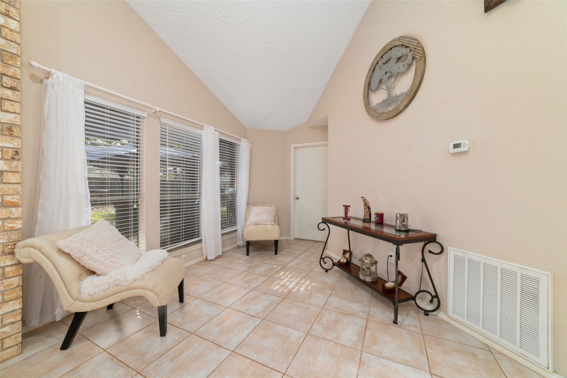 3315 Haydee Road Spring, TX 77388 - Photo 10 of 29 a view of a room with furniture and a window