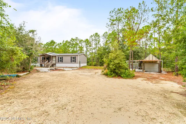 a house with trees in the background