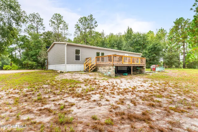 a house with trees in the background