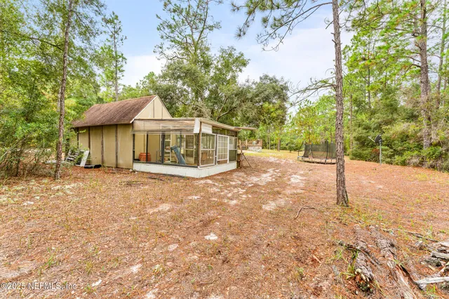 a house with trees in front of it