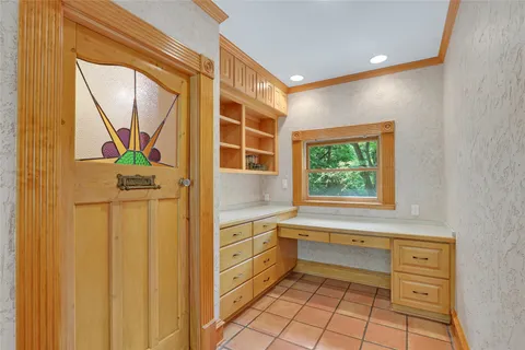 a bedroom with furniture window and a table