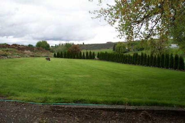 1800 Stone Road Yakima, WA 98908 - Photo 8 of 9 a view of an outdoor space and a yard