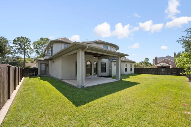 a view of a garden with swimming pool