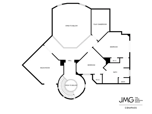 a front view of a residential apartment building with a yard