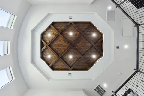 a kitchen with a stove kitchen island and stainless steel appliances