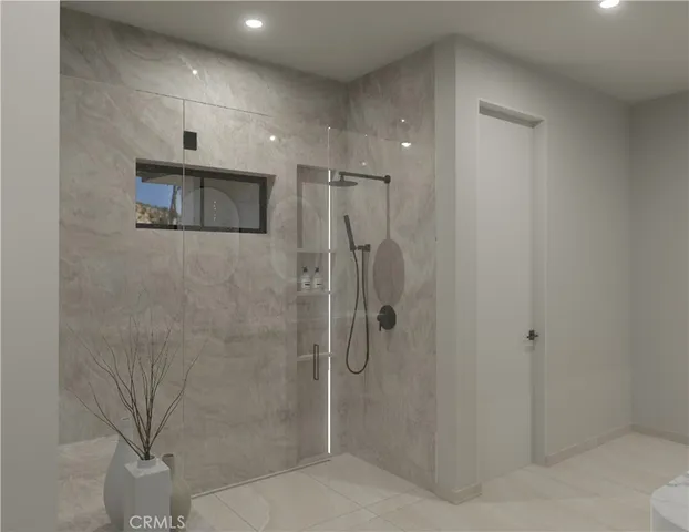 a bathroom with a shower and a sink