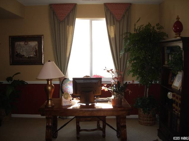 10623 Fort Morgan Way, Unit 1 Reno, NV 89521 - Photo 3 of 6 a view of a workspace with furniture