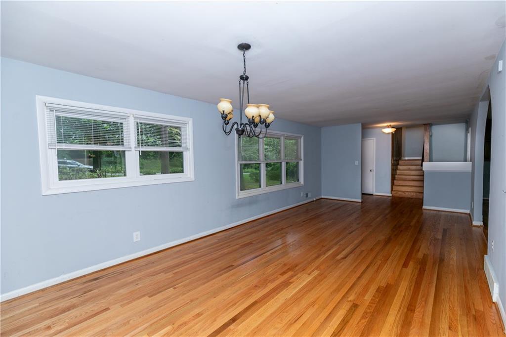 3175 Alton Road Atlanta, GA 30341 - Photo 20 of 76 a view of a room with wooden floors and windows