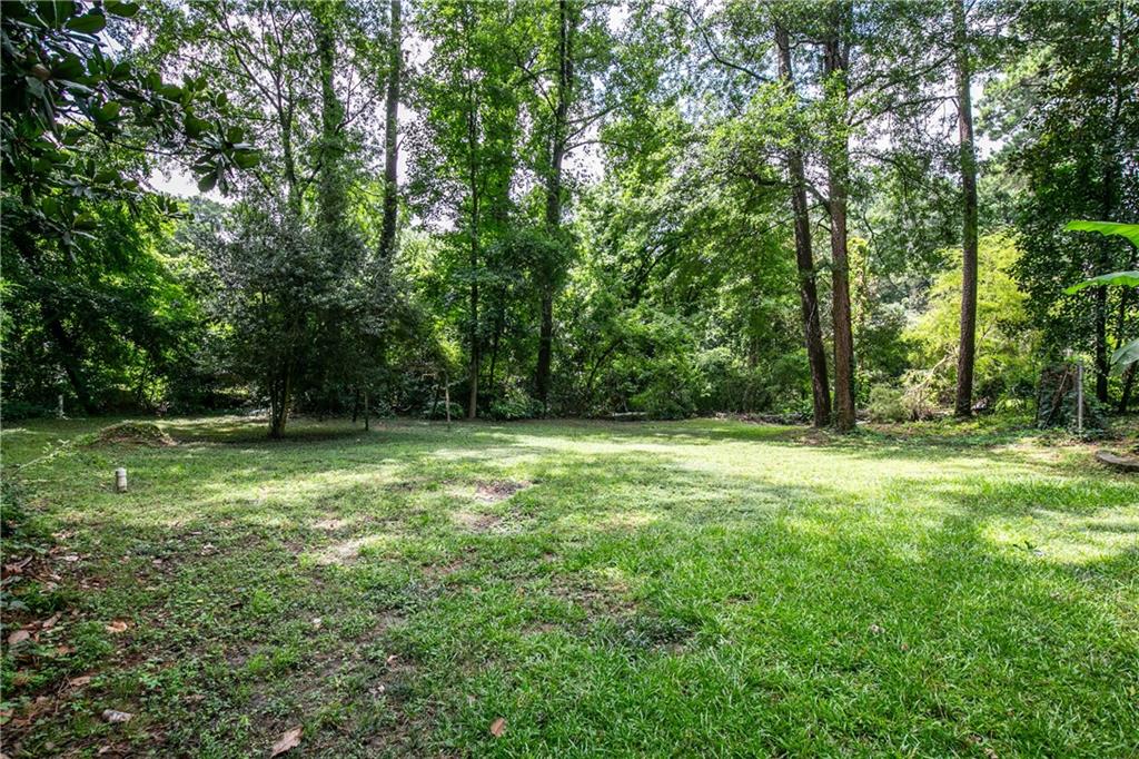 3175 Alton Road Atlanta, GA 30341 - Photo 70 of 76 a view of outdoor space with deck and yard