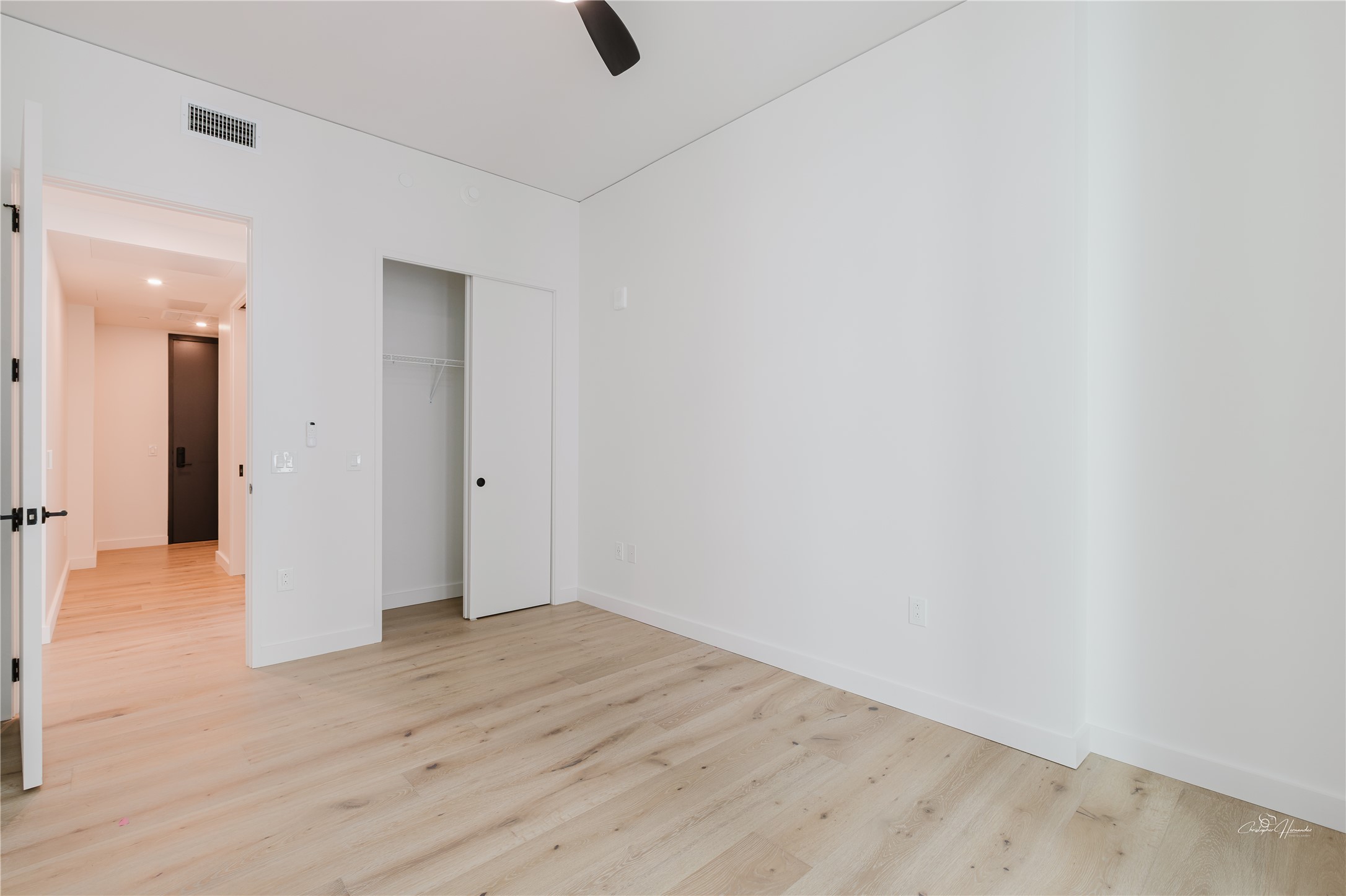 610 Davis Street, Unit 2608 Austin, TX 78701 - Photo 14 of 39 wooden floor in an empty room