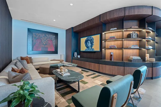 a black and white photo of a living room