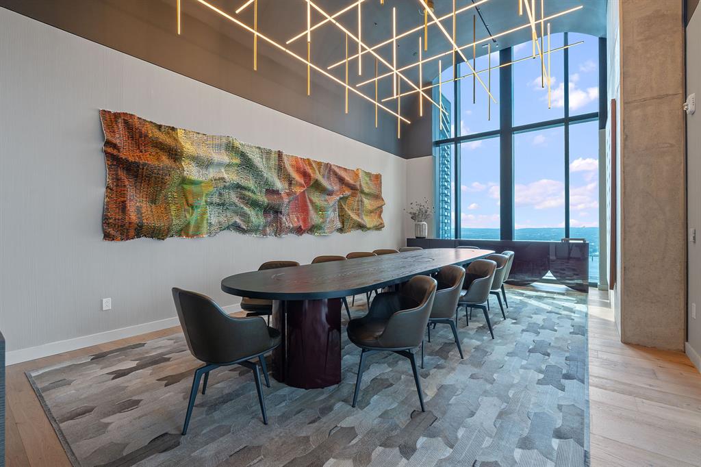 610 Davis Street, Unit 2608 Austin, TX 78701 - Photo 27 of 39 a view of a dinning table and chairs in the room