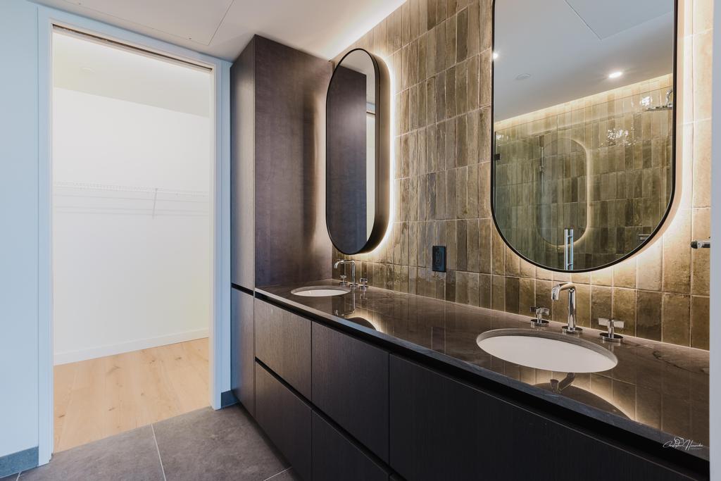 610 Davis Street, Unit 2608 Austin, TX 78701 - Photo 6 of 39 a bathroom with a double vanity sink and a mirror