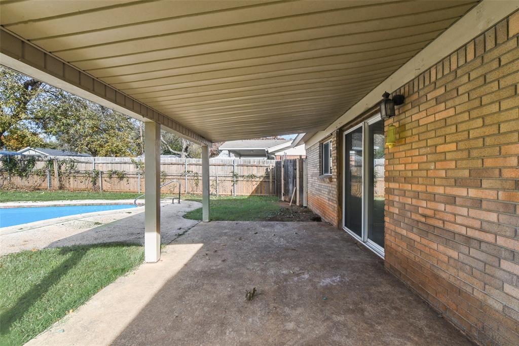 413 Simmons Drive Hurst, TX 76053 - Photo 13 of 26 a view of a porch with a sink
