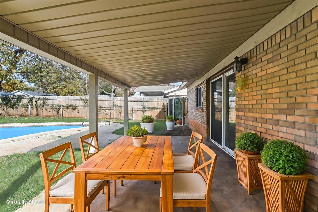 413 Simmons Drive Hurst, TX 76053 - Photo 5 of 26 a outdoor space with furniture