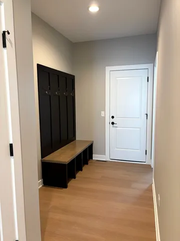 a view of room with hardwood floor