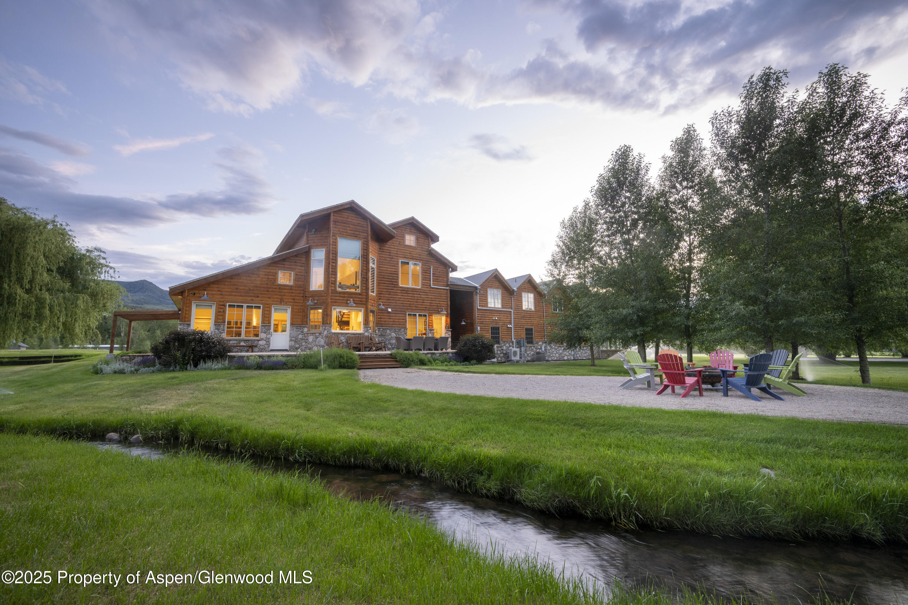 1207 Hooks Spur Road Basalt, CO 81621 - Photo 15 of 35 3-Exterior House Dusk Hooks-Spur-3086