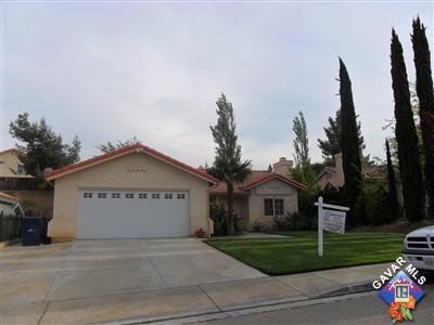 3248 Shale Road Palmdale, CA 93550 - Photo 1 of 19 a view of a house with a yard and large tree