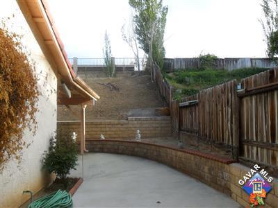 3248 Shale Road Palmdale, CA 93550 - Photo 19 of 19 a view of a pathway of a building