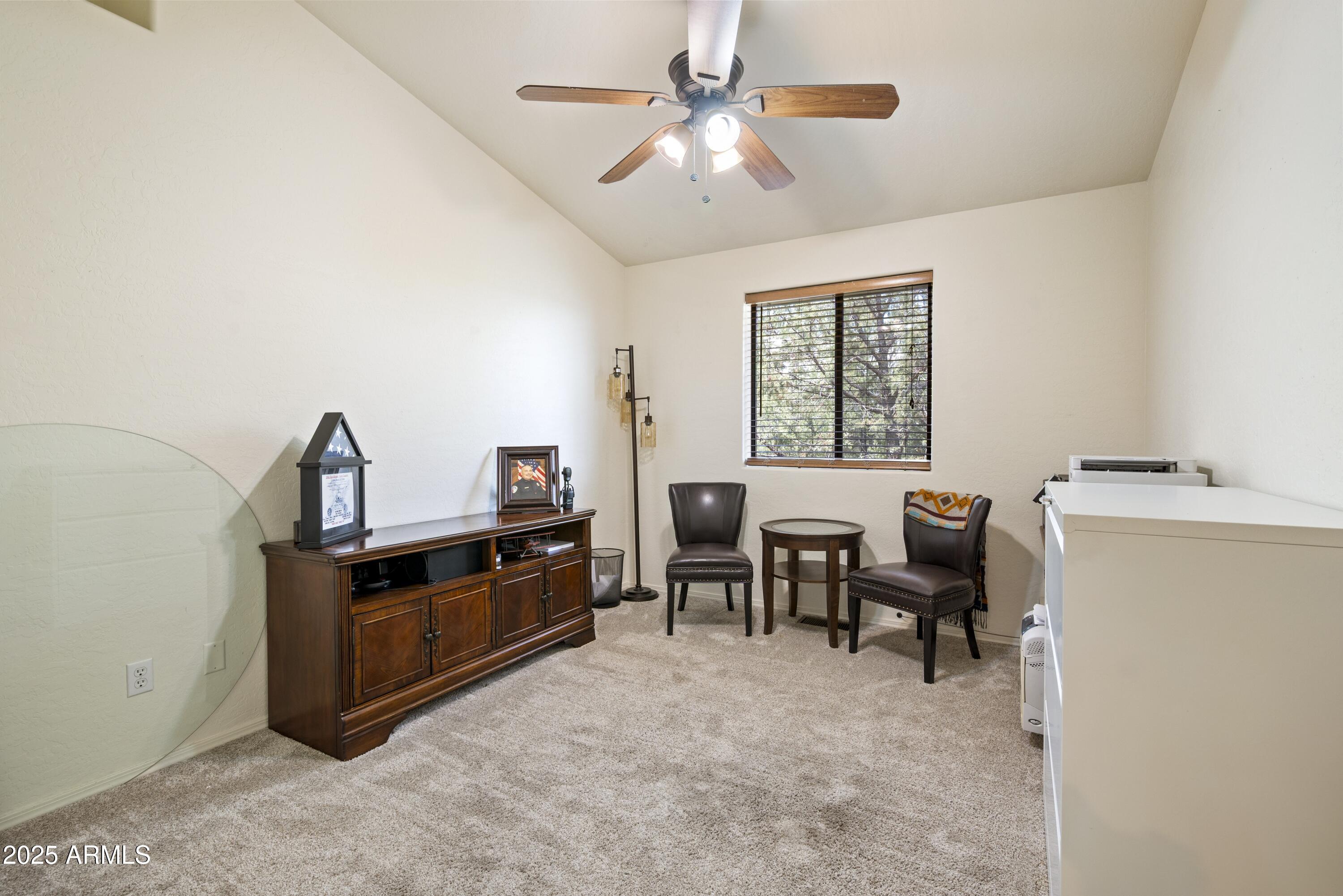 814 West Rim View Road Payson, AZ 85541 - Photo 25 of 42 a living room with furniture and a window
