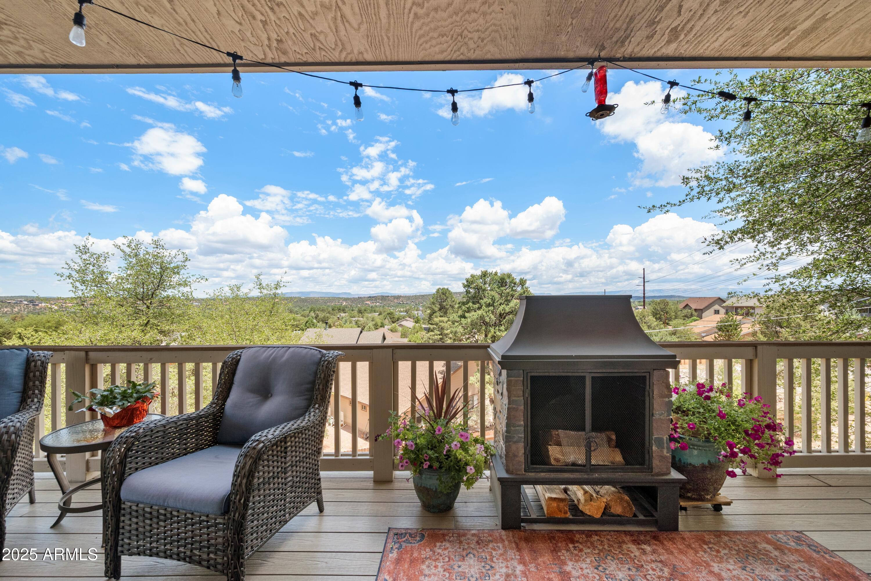 814 West Rim View Road Payson, AZ 85541 - Photo 28 of 42 a view of a balcony with chairs