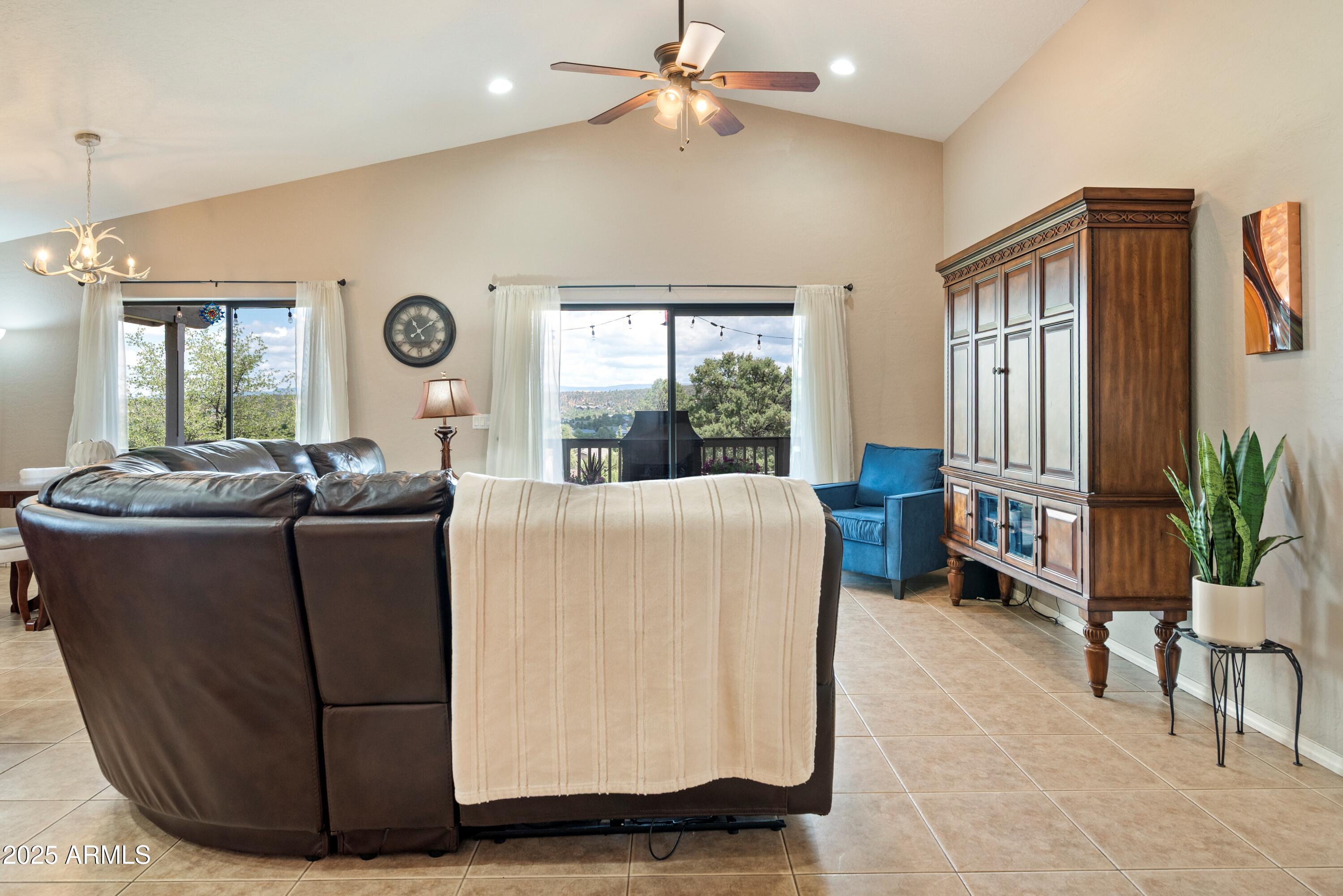 814 West Rim View Road Payson, AZ 85541 - Photo 8 of 42 a living room with furniture and a large window