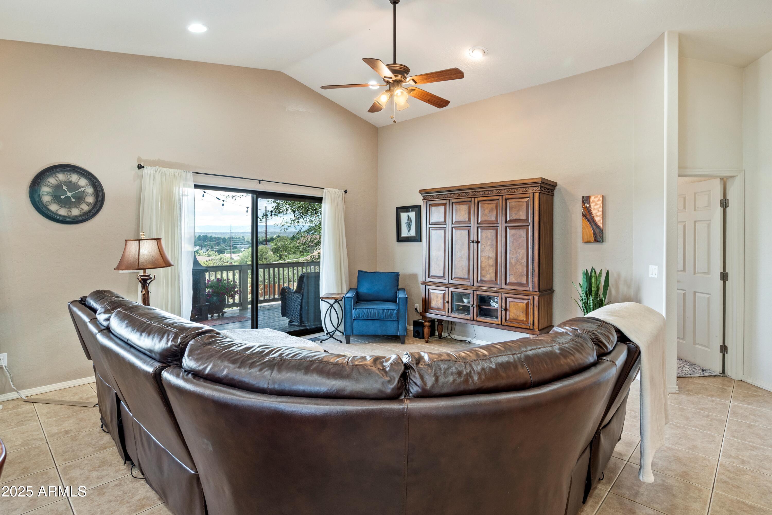 814 West Rim View Road Payson, AZ 85541 - Photo 10 of 42 a living room with furniture and a large window
