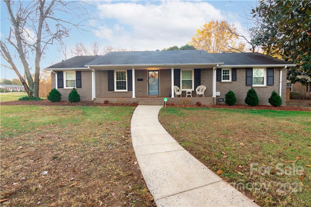 5201 Londonderry Road Charlotte, NC 28210 - Photo 1 of 42 front view of a brick house with a yard
