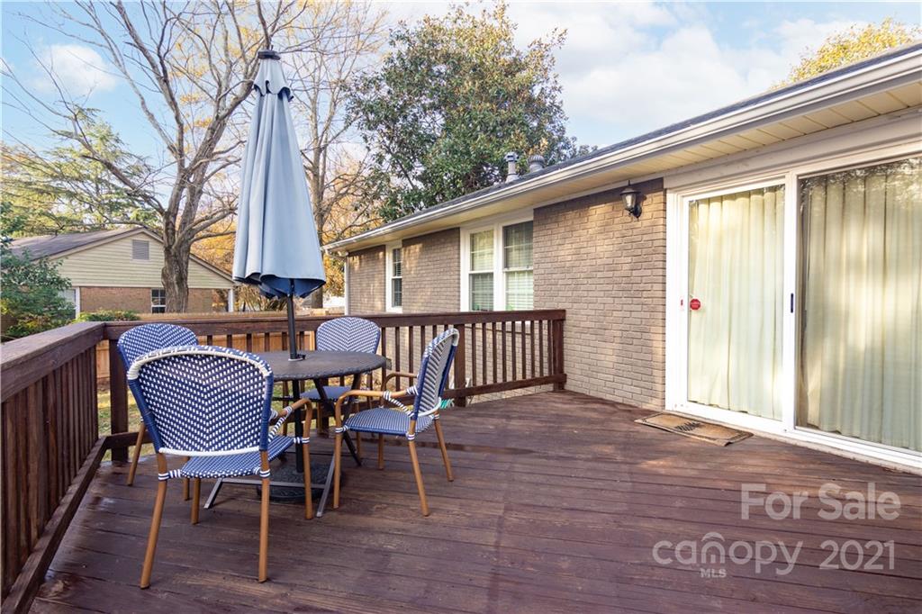 5201 Londonderry Road Charlotte, NC 28210 - Photo 2 of 42 a view of a chair and table in the balcony