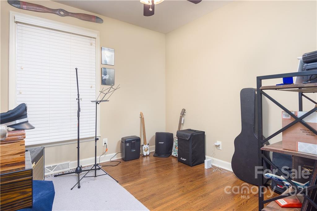 5201 Londonderry Road Charlotte, NC 28210 - Photo 23 of 42 a view of a livingroom with furniture and windows