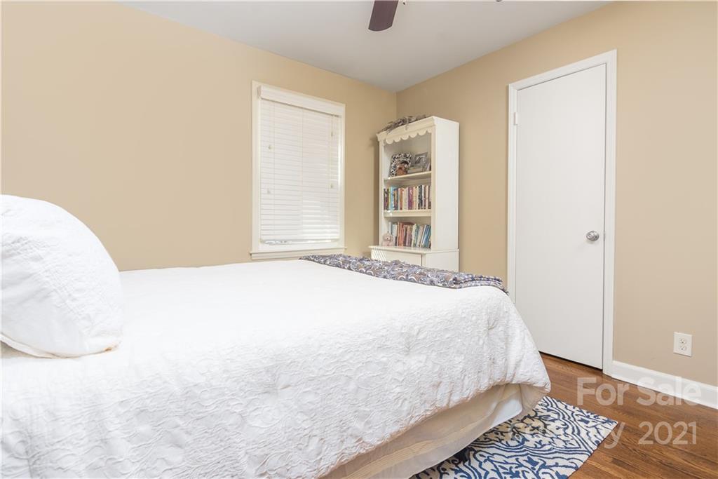 5201 Londonderry Road Charlotte, NC 28210 - Photo 32 of 42 a bedroom with a bed and a window