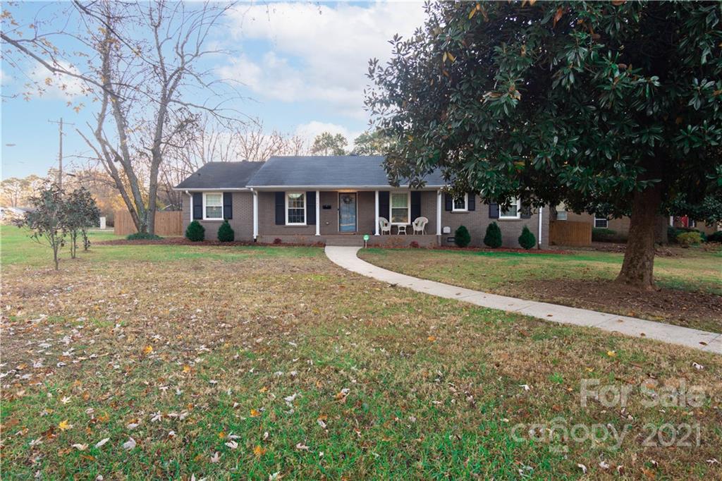 5201 Londonderry Road Charlotte, NC 28210 - Photo 36 of 42 a front view of a house with a yard