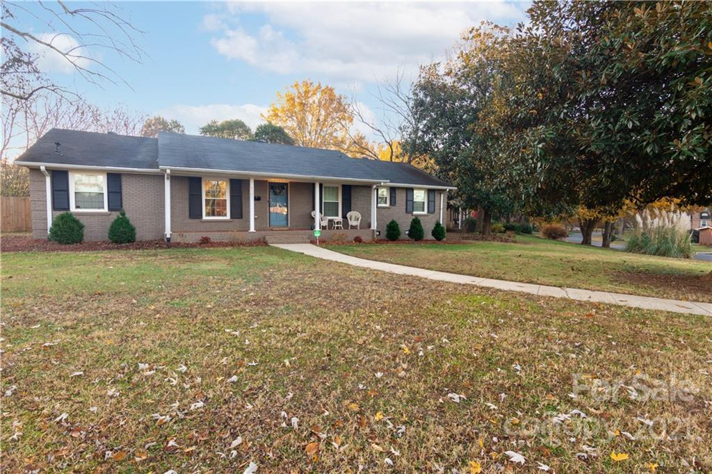 5201 Londonderry Road Charlotte, NC 28210 - Photo 38 of 42 a front view of a house with a yard
