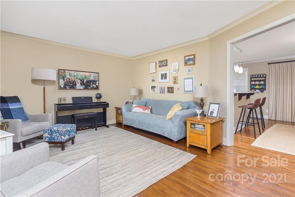 5201 Londonderry Road Charlotte, NC 28210 - Photo 7 of 42 a living room with furniture and a wooden floor