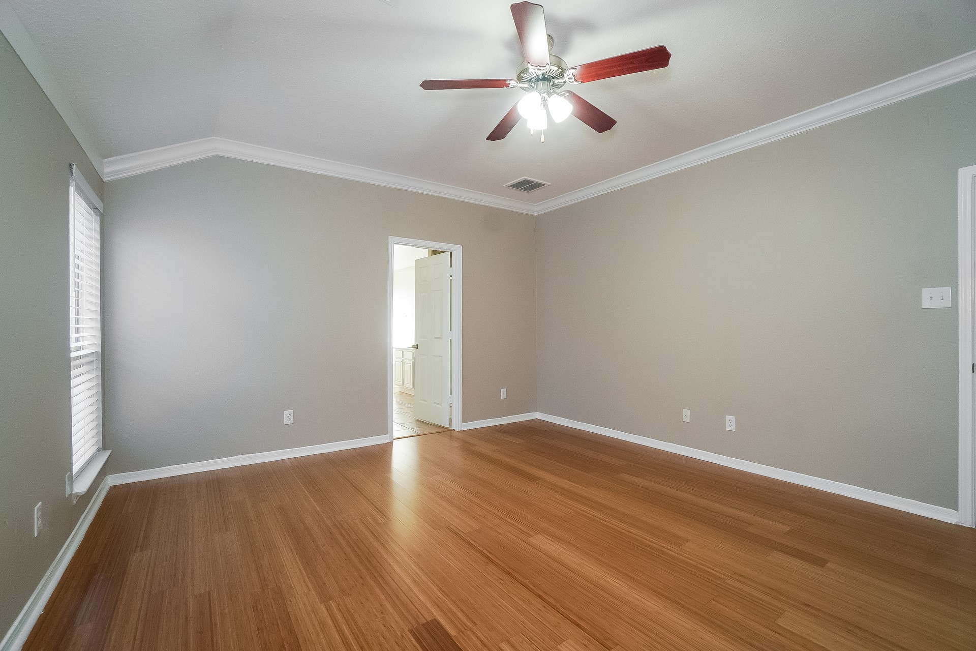 24223 Camillia Ridge Way Katy, TX 77493 - Photo 10 of 16 a view of an empty room with wooden floor