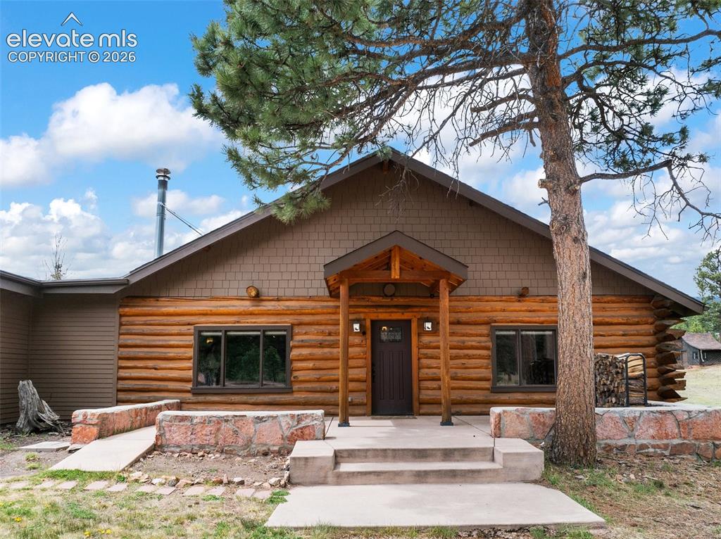 1100 Rampart Range Road Woodland Park, CO 80863 - Photo 3 of 50 This 1930s ranch-style log cabin was meticulously converted into a residence in 2013