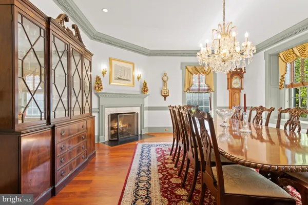 a hallway with sink and cabinets