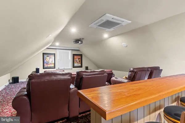 a living room with a couch and a flat screen tv