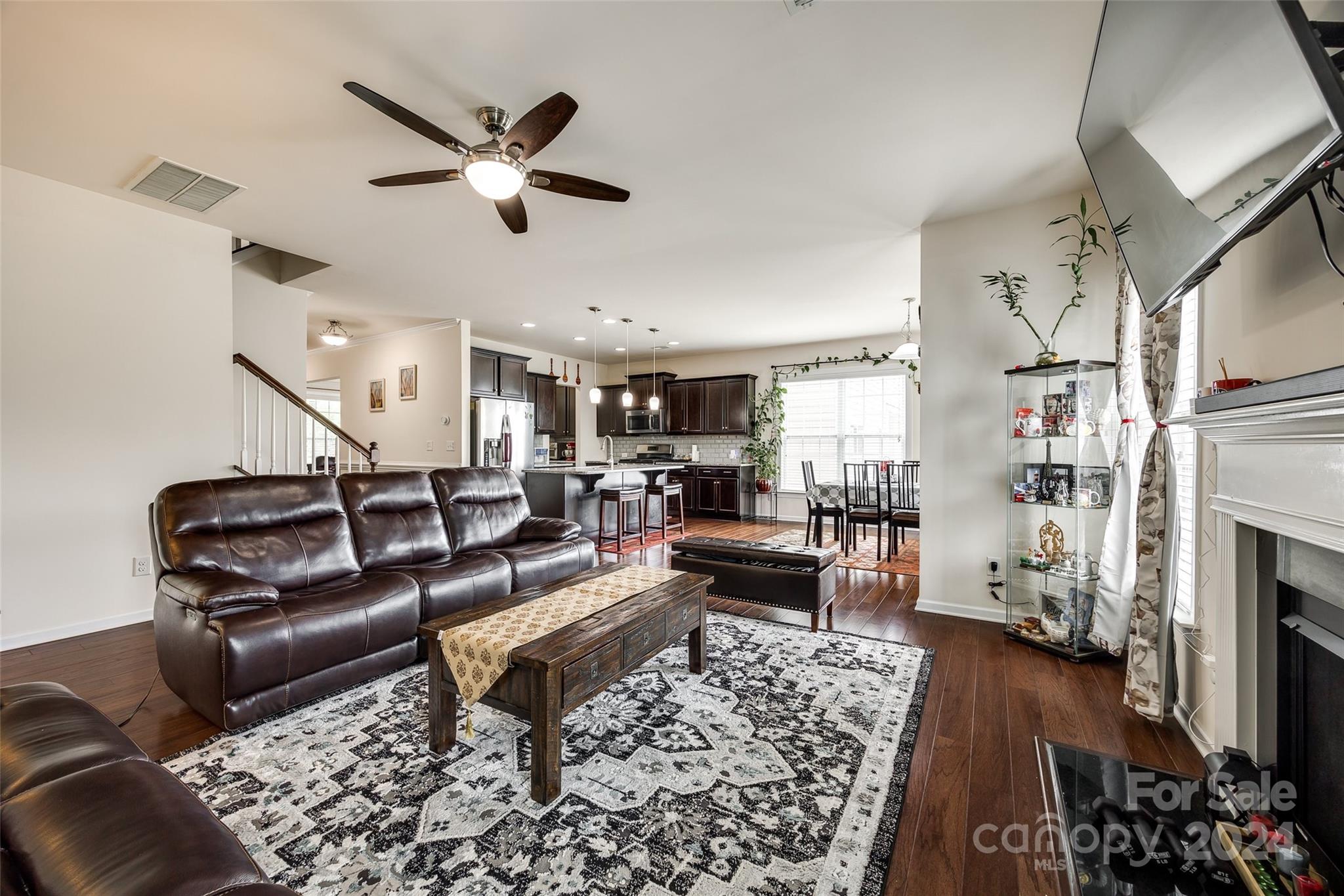 819 Bridge View Court Fort Mill, SC 29708 - Photo 11 of 40 a living room with furniture fireplace and a window