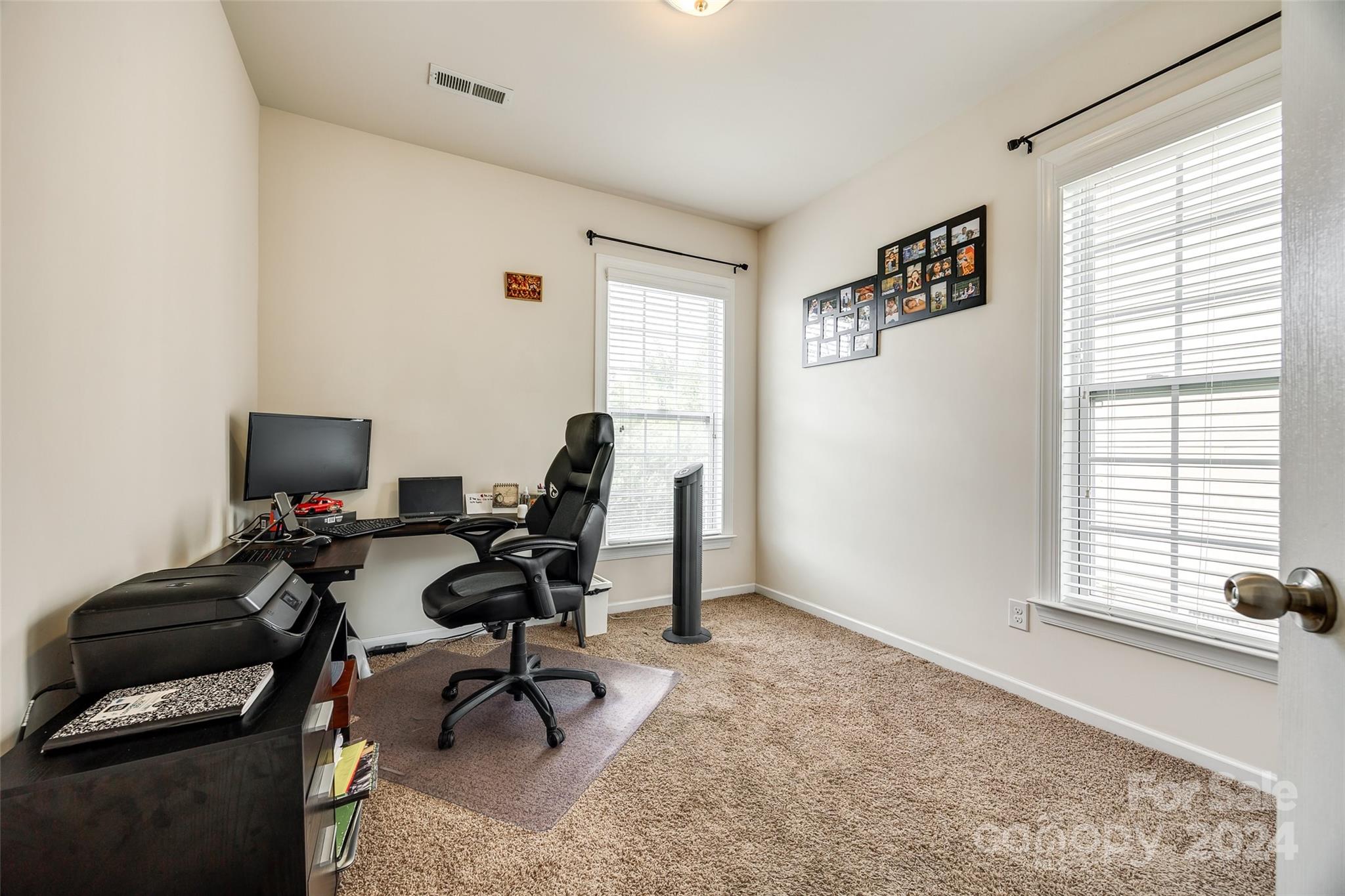 819 Bridge View Court Fort Mill, SC 29708 - Photo 14 of 40 a view of a workspace with furniture and a window