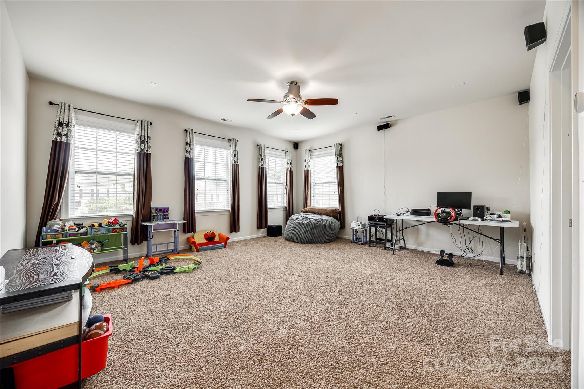 819 Bridge View Court Fort Mill, SC 29708 - Photo 23 of 40 a living room with furniture and a large window
