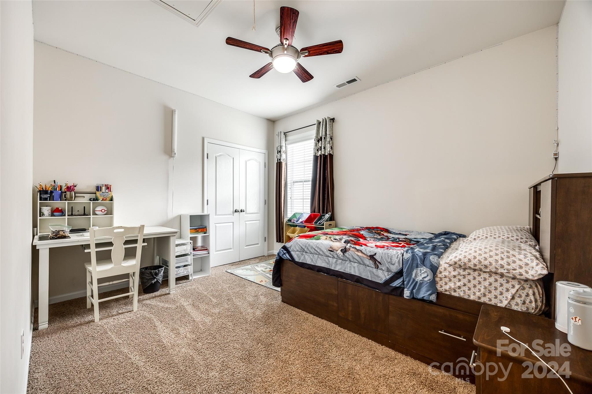 819 Bridge View Court Fort Mill, SC 29708 - Photo 26 of 40 a bedroom with furniture and a window
