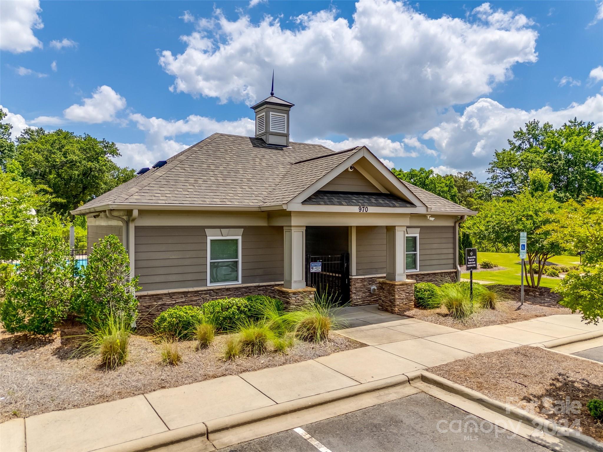 819 Bridge View Court Fort Mill, SC 29708 - Photo 35 of 40 a front view of house with yard outdoor seating and barbeque oven
